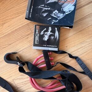 P90x workout tapes, tension strap and Guide